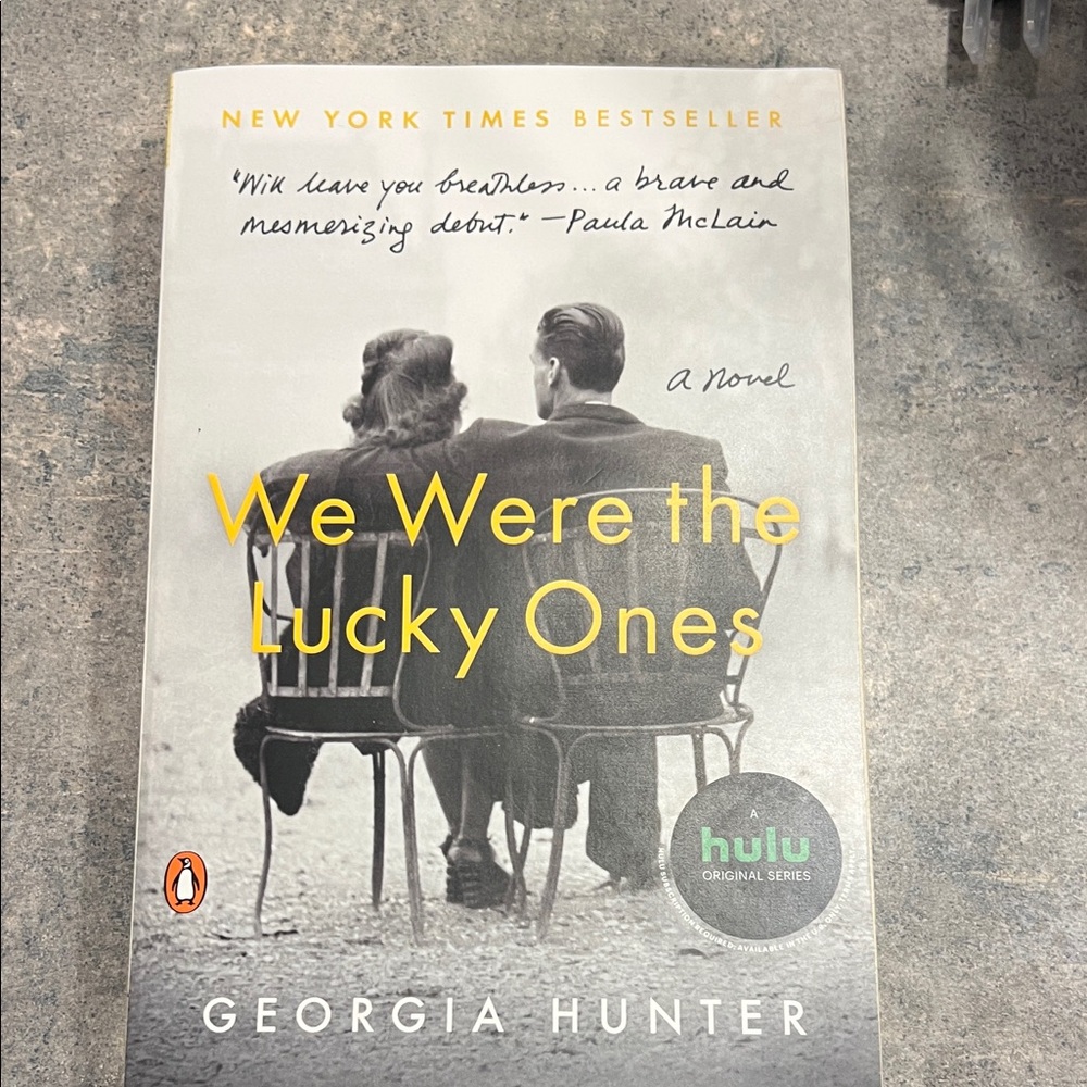 "We Were the Lucky Ones" by Georgia Hunter - Gray Cover